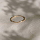 Handcrafted TALLULAH ring in 18k recycled gold, featuring a semi-matte finish, made in Basel, Switzerland.