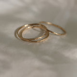 Handcrafted TALLULAH rings in 18k recycled gold, featuring a semi-matte finish, designed in Basel, Switzerland.