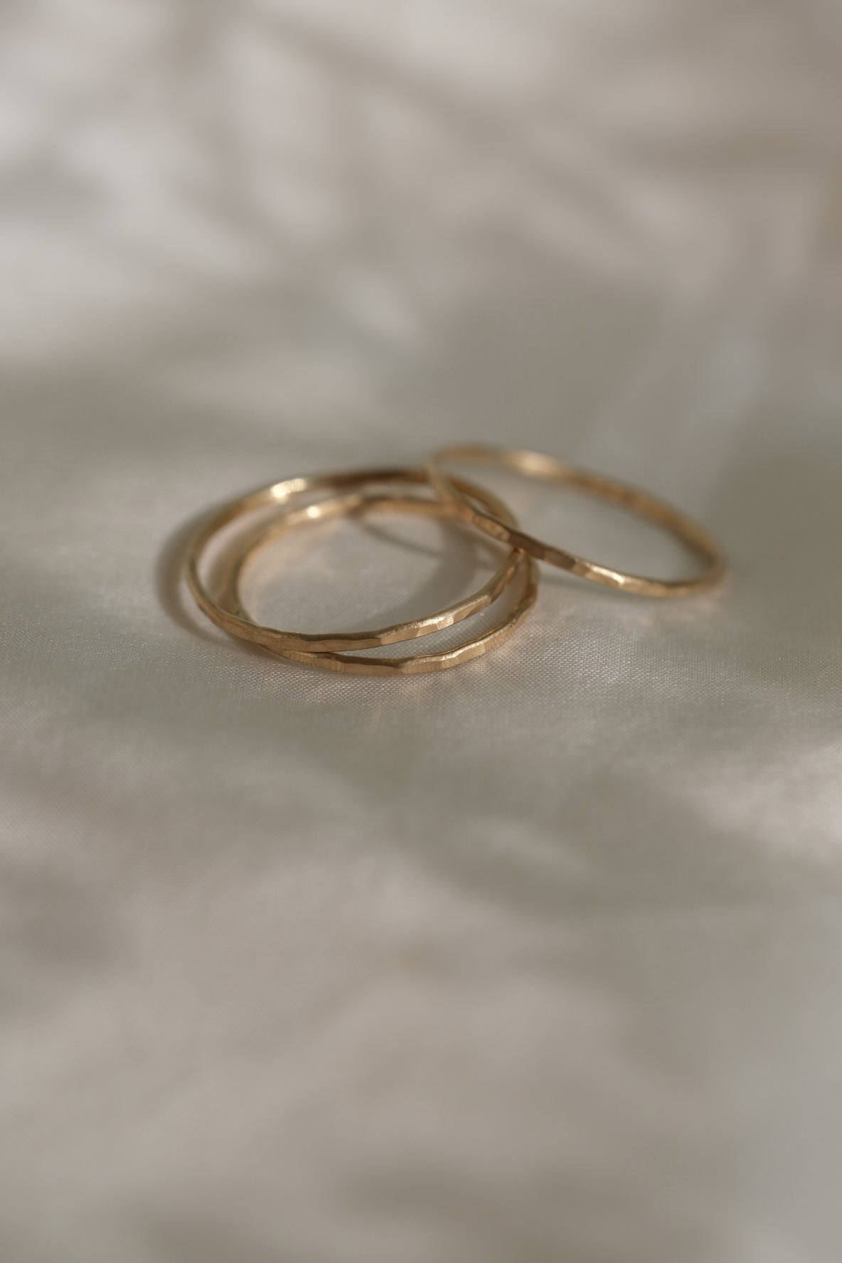 Handcrafted TALLULAH rings in 18k recycled gold, featuring a semi-matte finish, designed in Basel, Switzerland.