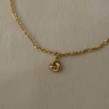 18k recycled gold bracelet featuring a small charming detail, handcrafted in Basel, Switzerland.