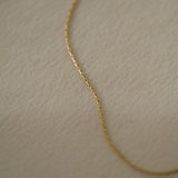 Close-up of LUCID Chain handcrafted from 18k recycled gold, featuring an elongated faceted box design.
