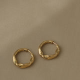 AGAPI hoops made from sustainable 18k recycled gold, local production in Basel, Switzerland.