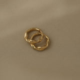 AGAPI hoops in 18k recycled gold from Basel, Switzerland, showcasing sustainable and local craftsmanship.