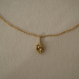 TOVE necklace in 18k recycled gold, handcrafted in Basel, Switzerland, featuring a delicate pendant design.