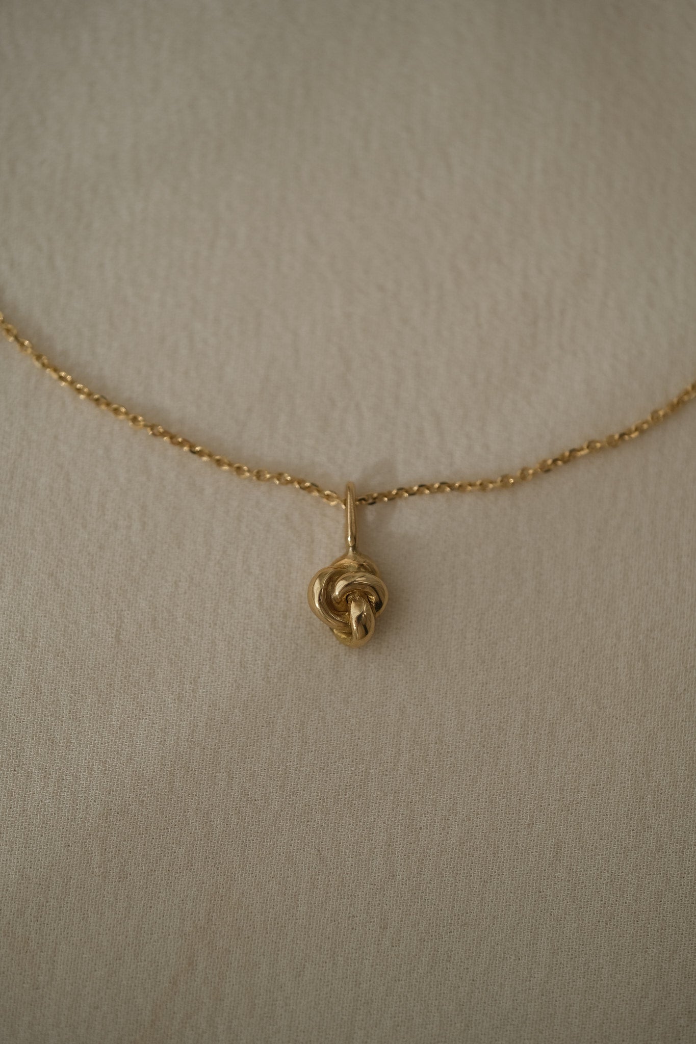 TOVE necklace in 18k recycled gold, handcrafted in Basel, Switzerland, featuring a delicate pendant design.