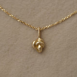 TOVE necklace in 18k recycled gold with pendant, handcrafted in Basel, Switzerland.
