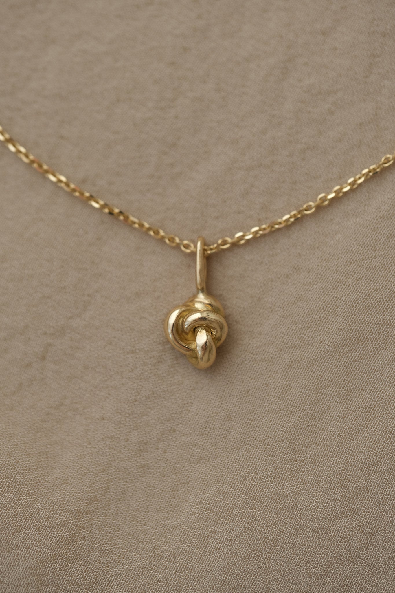 TOVE necklace in 18k recycled gold with pendant, handcrafted in Basel, Switzerland.