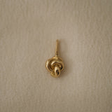 TOVE pendant handcrafted in 18k recycled gold, featuring a natural shiny surface, designed in Basel, Switzerland.