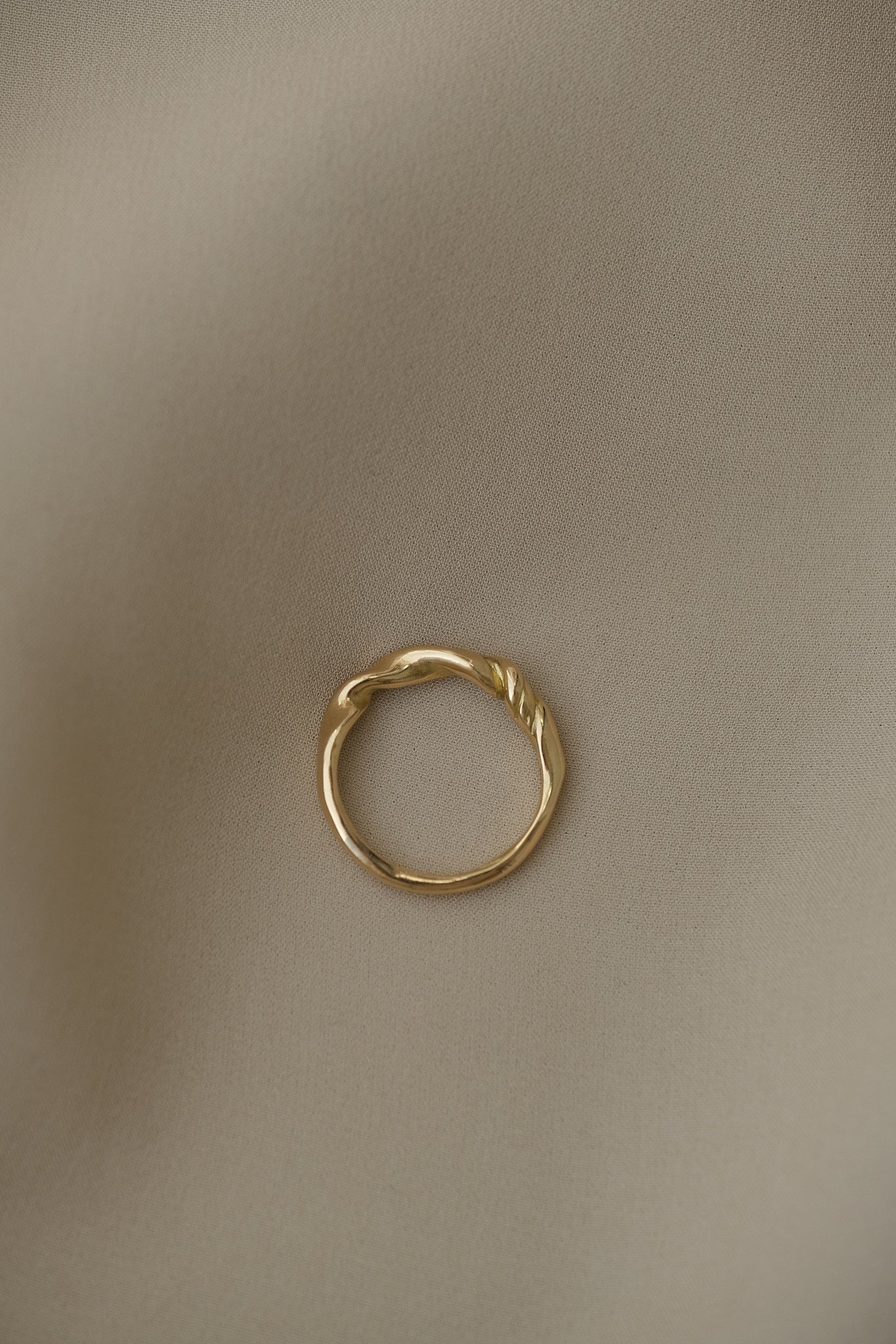 AGAPI ring in 18k recycled gold, handcrafted in Basel, Switzerland, with a natural shiny surface.