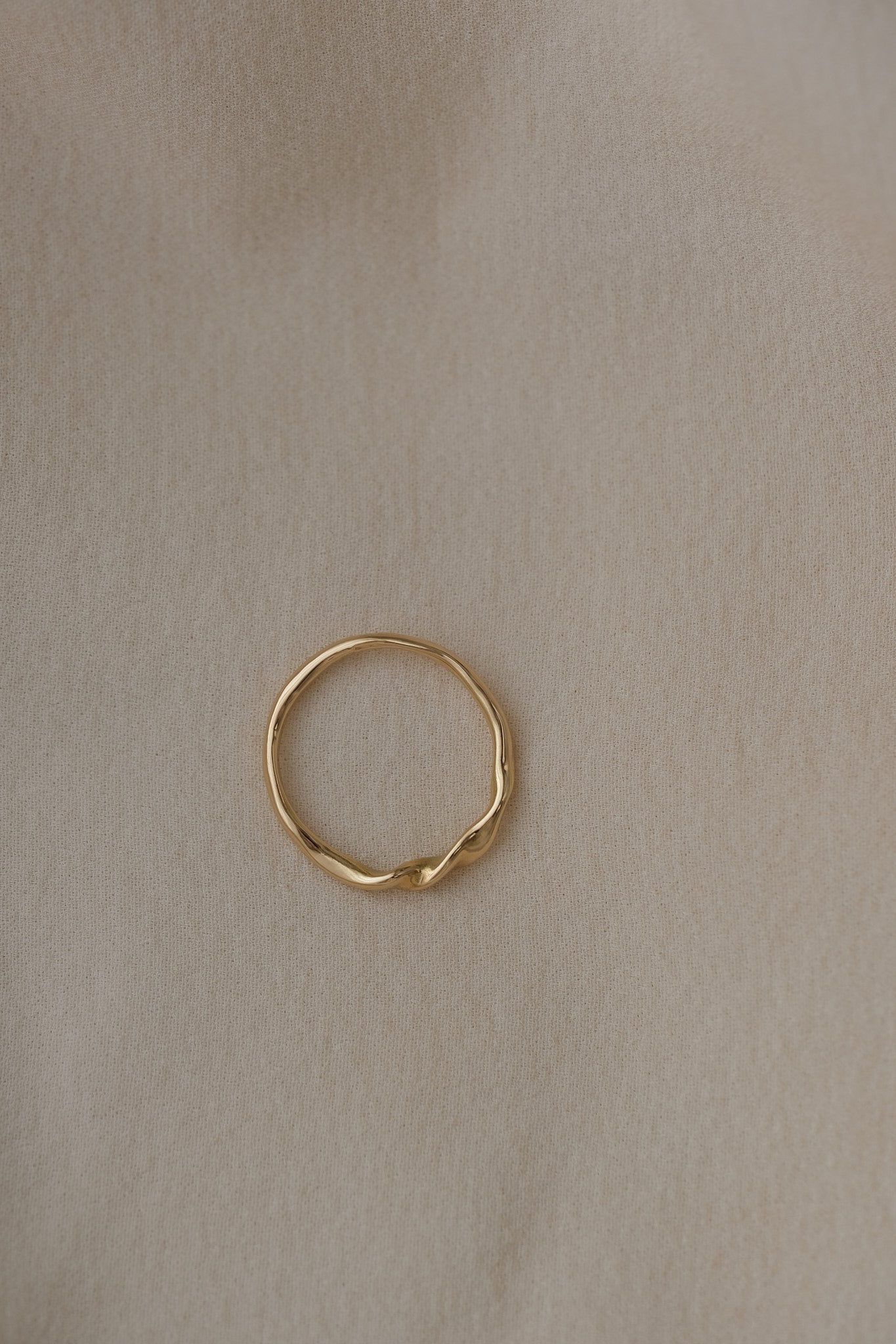 Handcrafted NYSSA ring in 18k recycled gold, featuring a natural shiny surface, designed in Basel, Switzerland.