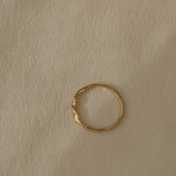 Handcrafted NYSSA ring in 18k recycled gold from Basel, Switzerland, featuring an organic, shiny surface.