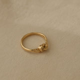 TWINE ring in 18k recycled gold, handcrafted in Basel, Switzerland with a natural shiny surface.