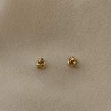 TOVE big studs, handcrafted 18k recycled gold earrings, featuring a natural shiny surface, made in Basel, Switzerland.