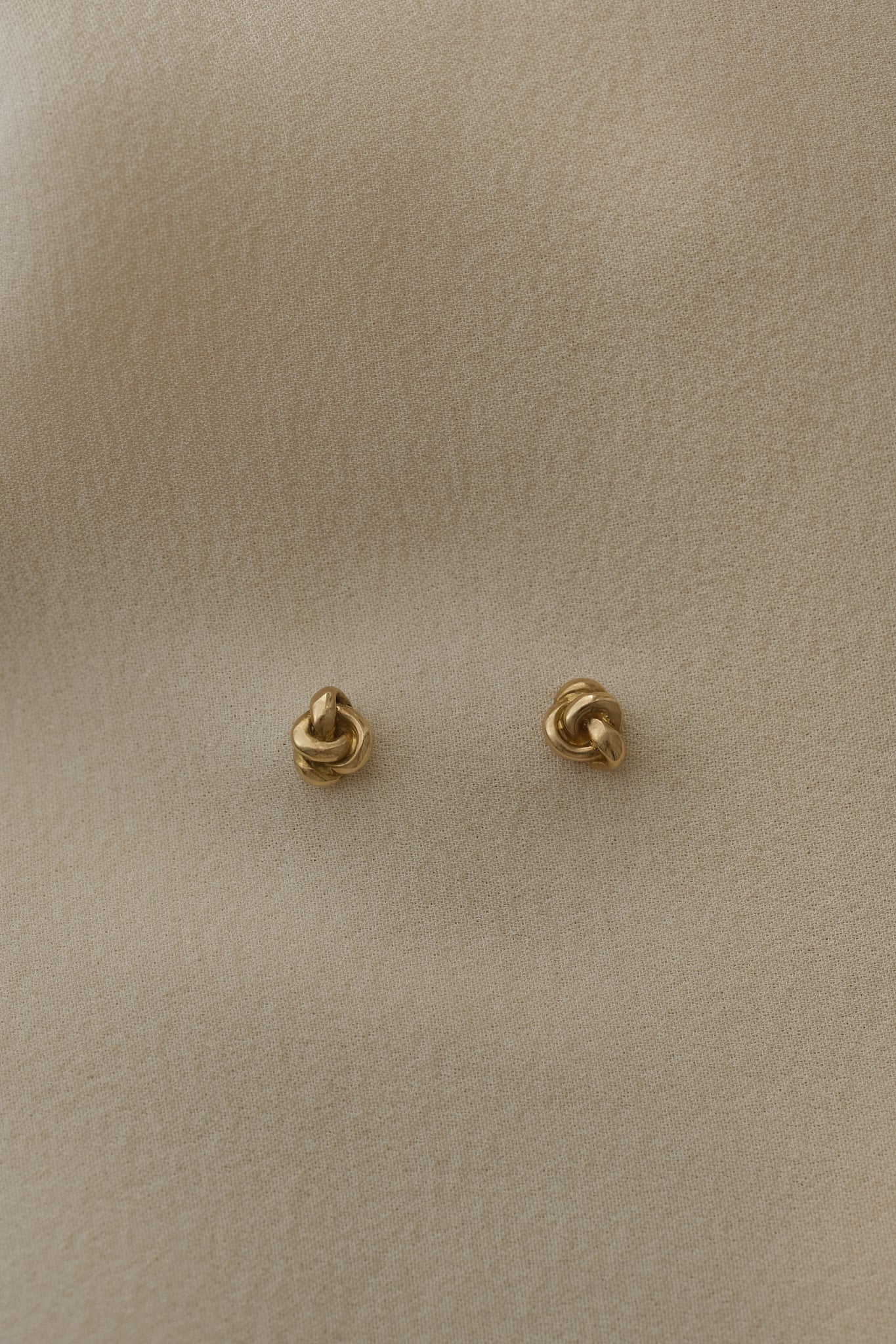TOVE big studs, handcrafted 18k recycled gold earrings, featuring a natural shiny surface, made in Basel, Switzerland.