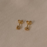TOVE small studs in 18k recycled gold, handcrafted in Basel Switzerland, featuring a natural shiny surface.