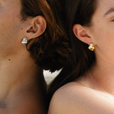 Ethically crafted CLOUD earrings in recycled silver, worn by two models, showcasing sustainable and handmade jewelry.