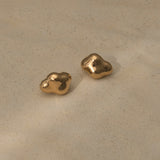 Handmade CLOUD earrings in 18k gold-plated recycled silver, showcasing a natural shiny finish, designed sustainably.