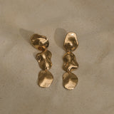 COSMA earrings in 18k gold-plated recycled silver, handmade, ethical jewelry, sustainable, with natural shiny surface.