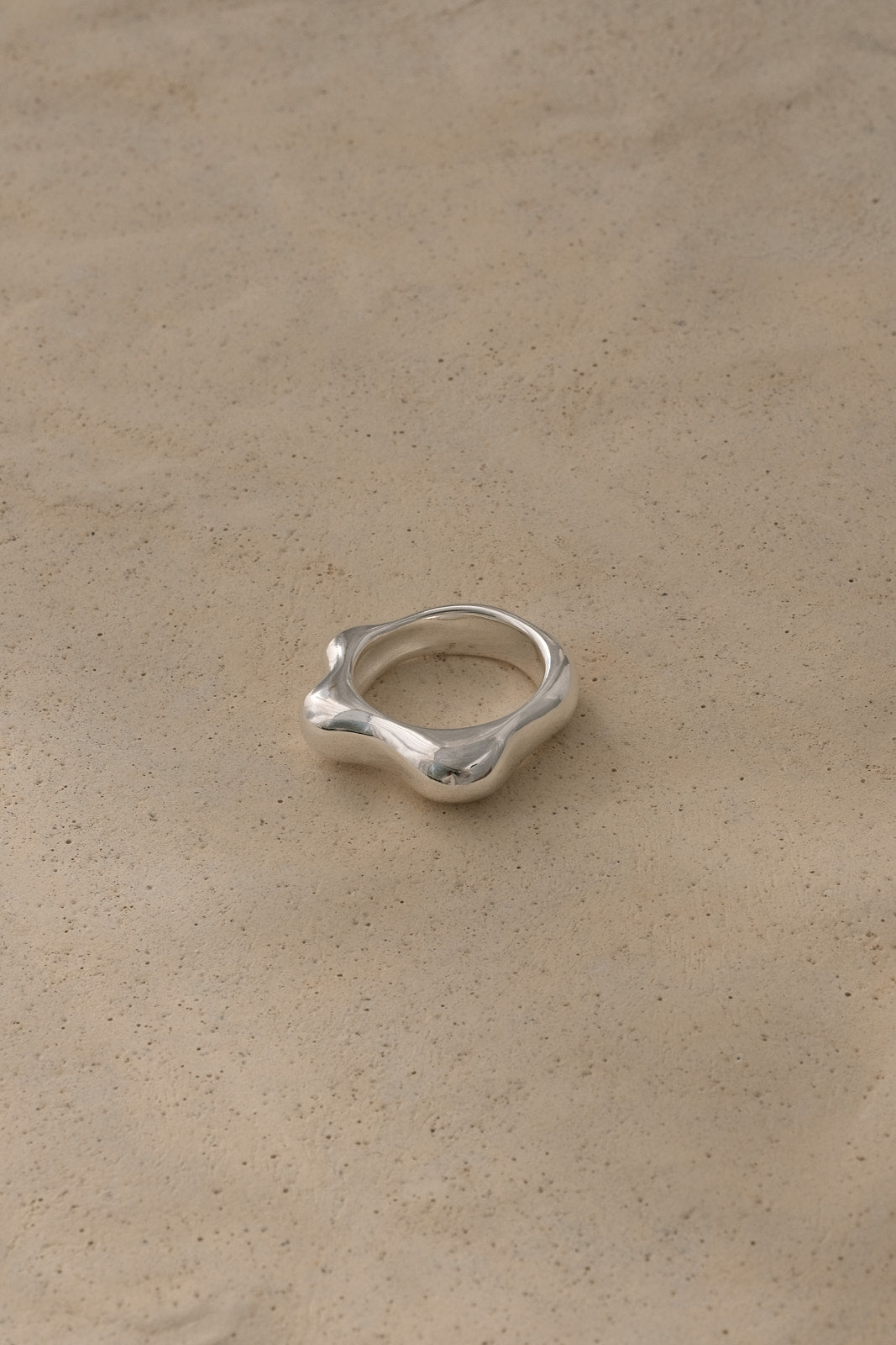 Handmade FLUID ring crafted from 925 recycled silver, embodying ethical jewelry and sustainable design.