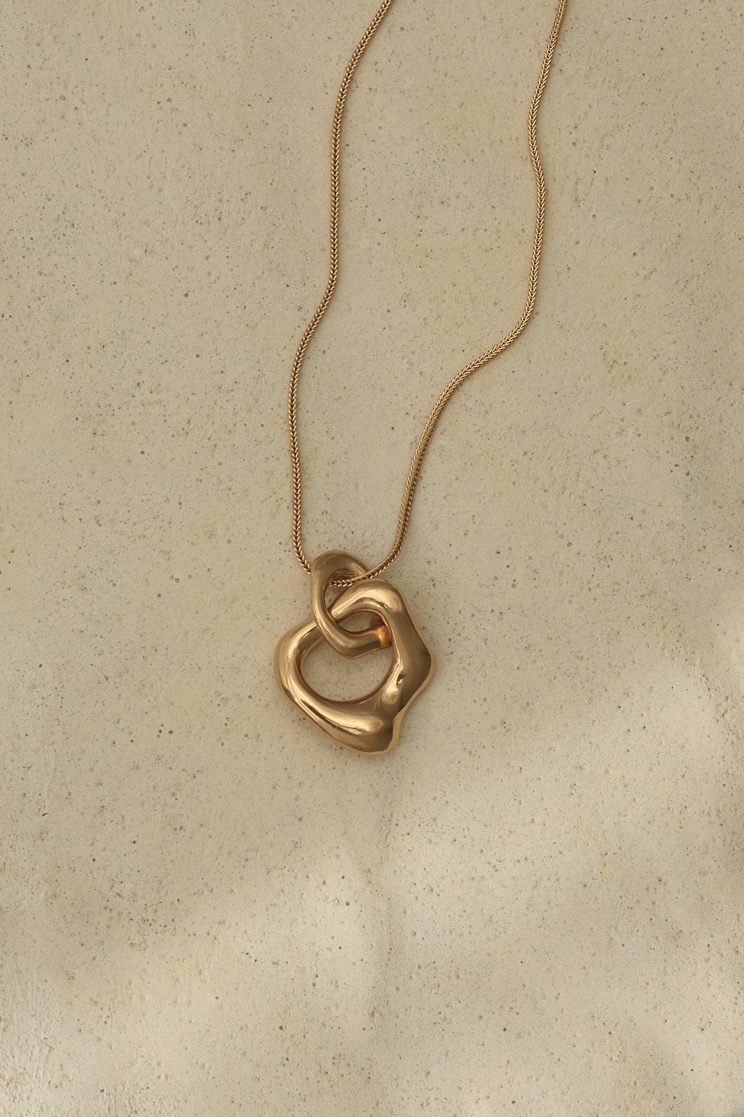FUSE necklace made of recycled gold, showcasing sustainable handmade ethical jewelry design.