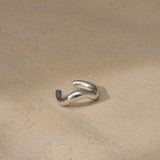 Handmade MISMO earcuff in recycled silver, reflecting sustainable and ethical jewelry principles.