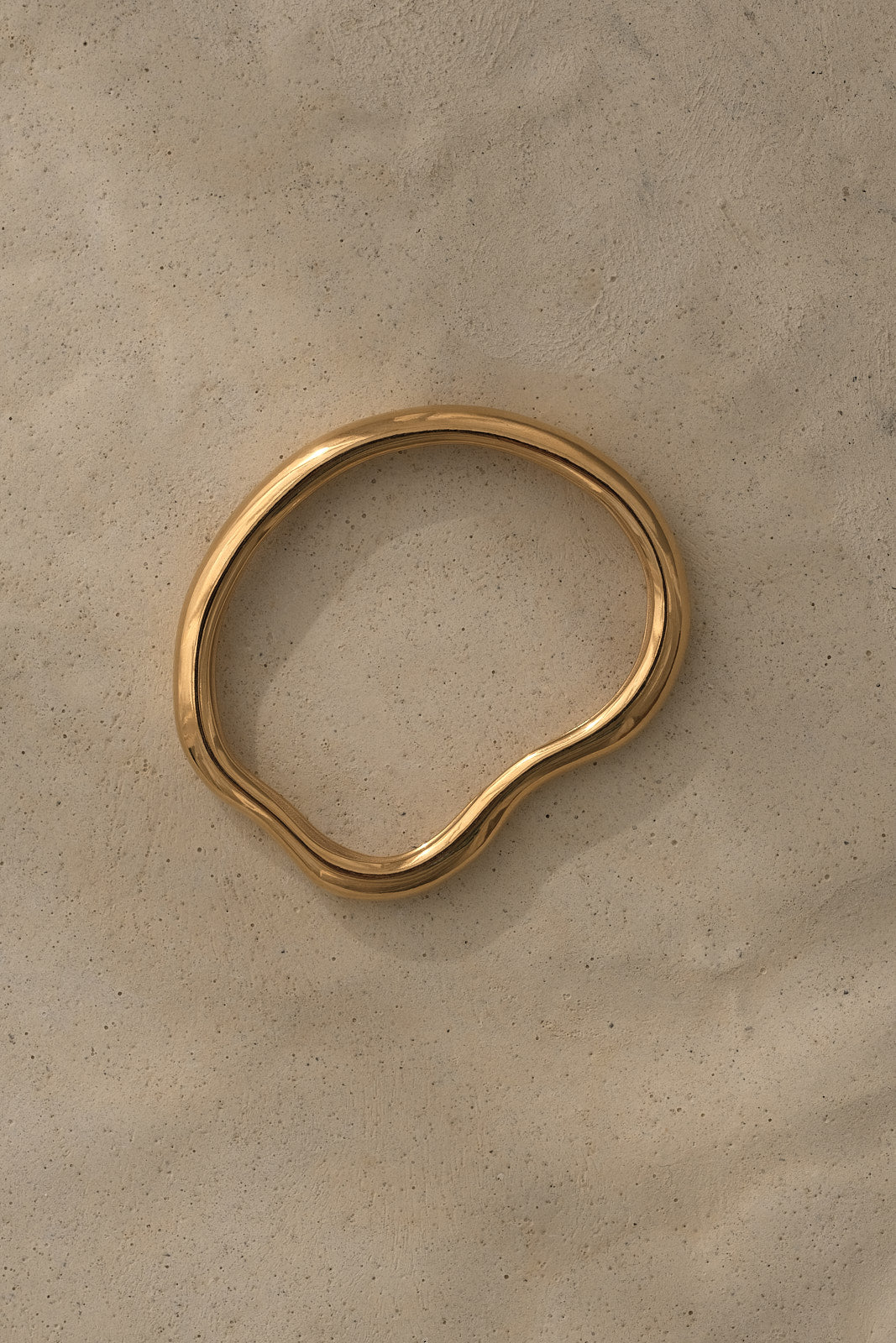 MUSA bangle in 18k gold-plated recycled silver, highlighting ethical jewelry and sustainable craftsmanship.