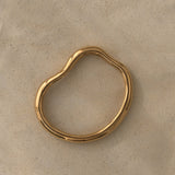 MUSA bangle in 18k gold-plated recycled silver, featuring a natural shiny surface, representing ethical handmade jewelry.