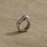 MUSA ring crafted from recycled silver, showcasing a natural shiny finish, sustainable and ethical jewelry.