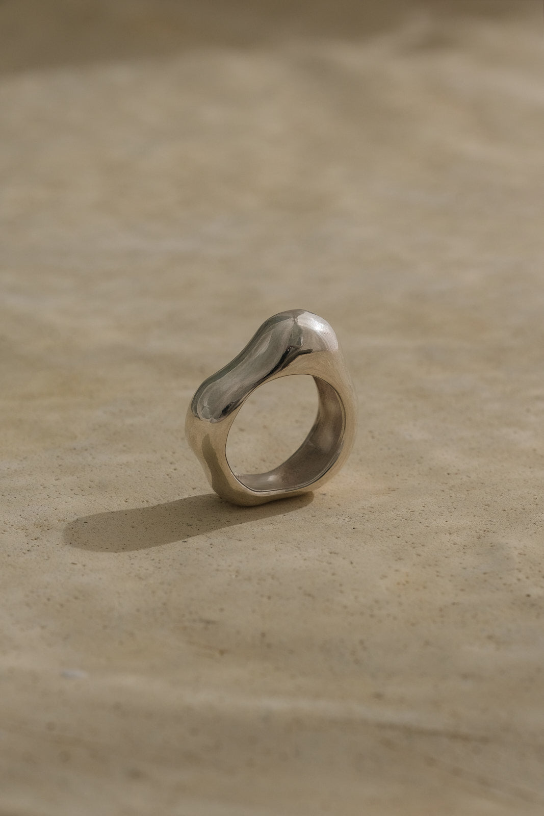 MUSA ring crafted from recycled silver, showcasing a natural shiny finish, sustainable and ethical jewelry.