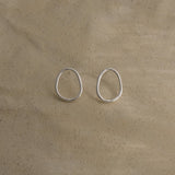 Handmade LOON small earrings in recycled silver, ethical and sustainable jewelry, featuring a natural semi-shiny surface.