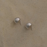 ONOA earrings made of recycled silver, 18k gold-plated, showcasing handmade ethical jewelry with a semi-matte finish.