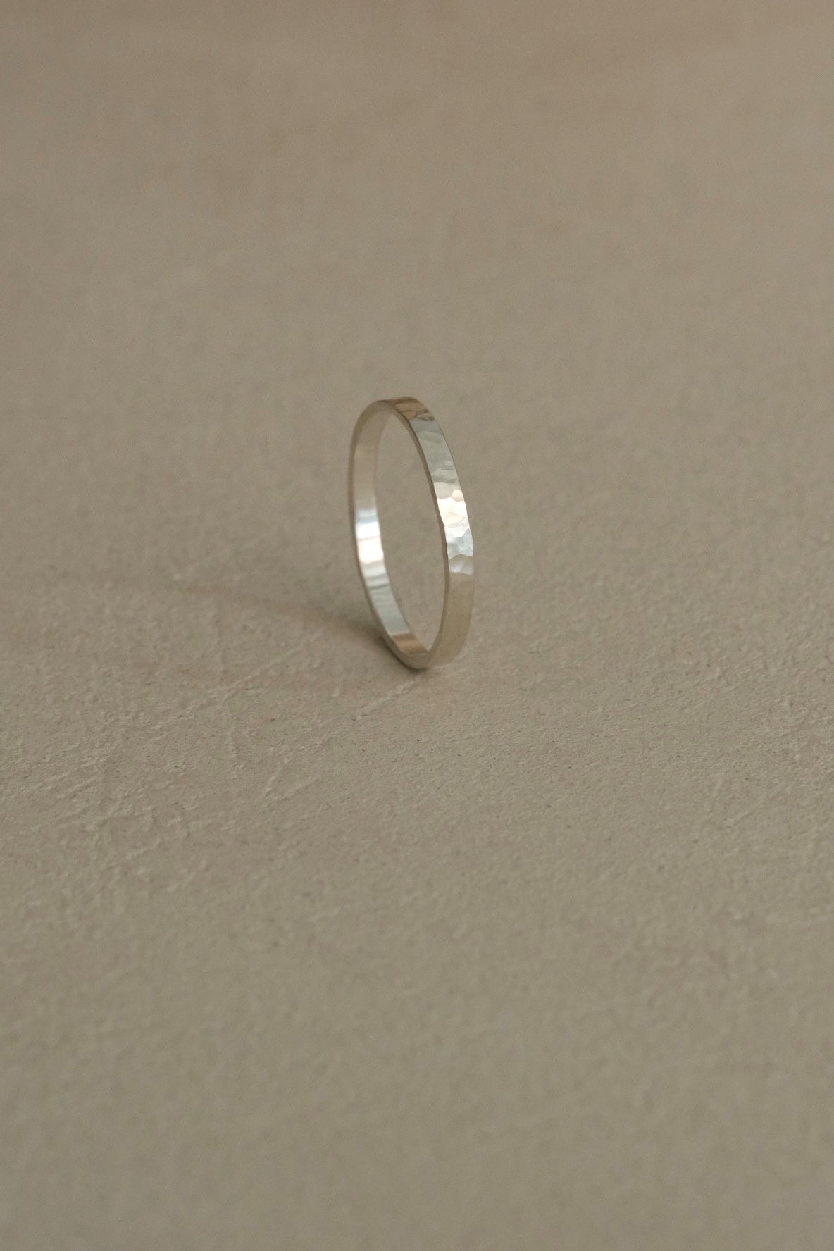 Handmade ISIA small ring in recycled silver with a semi-matte finish, showcasing ethical and sustainable jewelry.