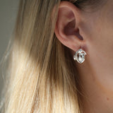 Handmade sustainable 925 recycled silver earrings showcasing unique design, created in Basel, Switzerland.