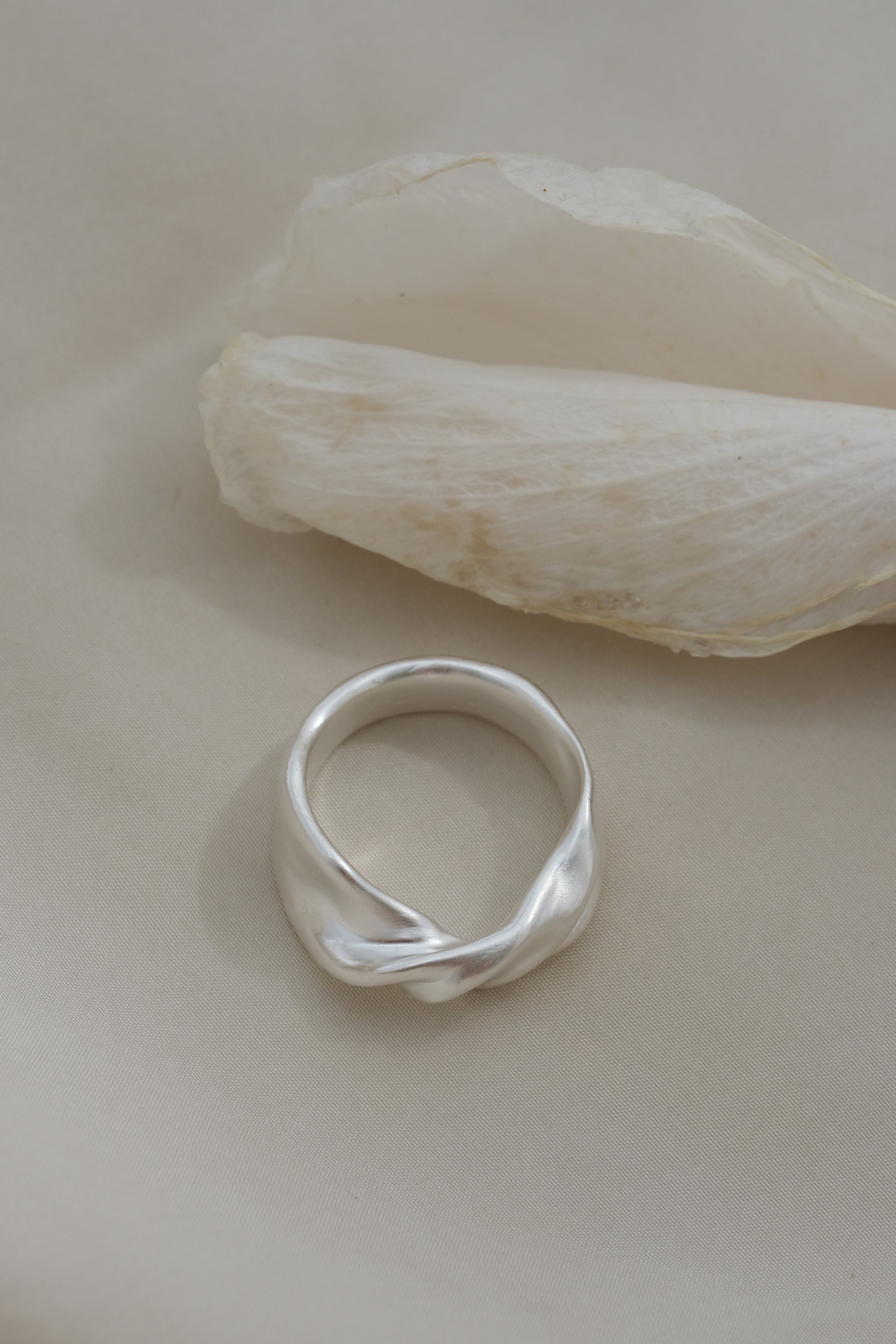 Satin-finish 925 recycled silver ring from Basel, showcasing unique handmade design and ethical craftsmanship.