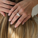Handmade DROP 04 ring in 925 recycled silver worn by a model showcasing unique sustainable jewelry in Basel.