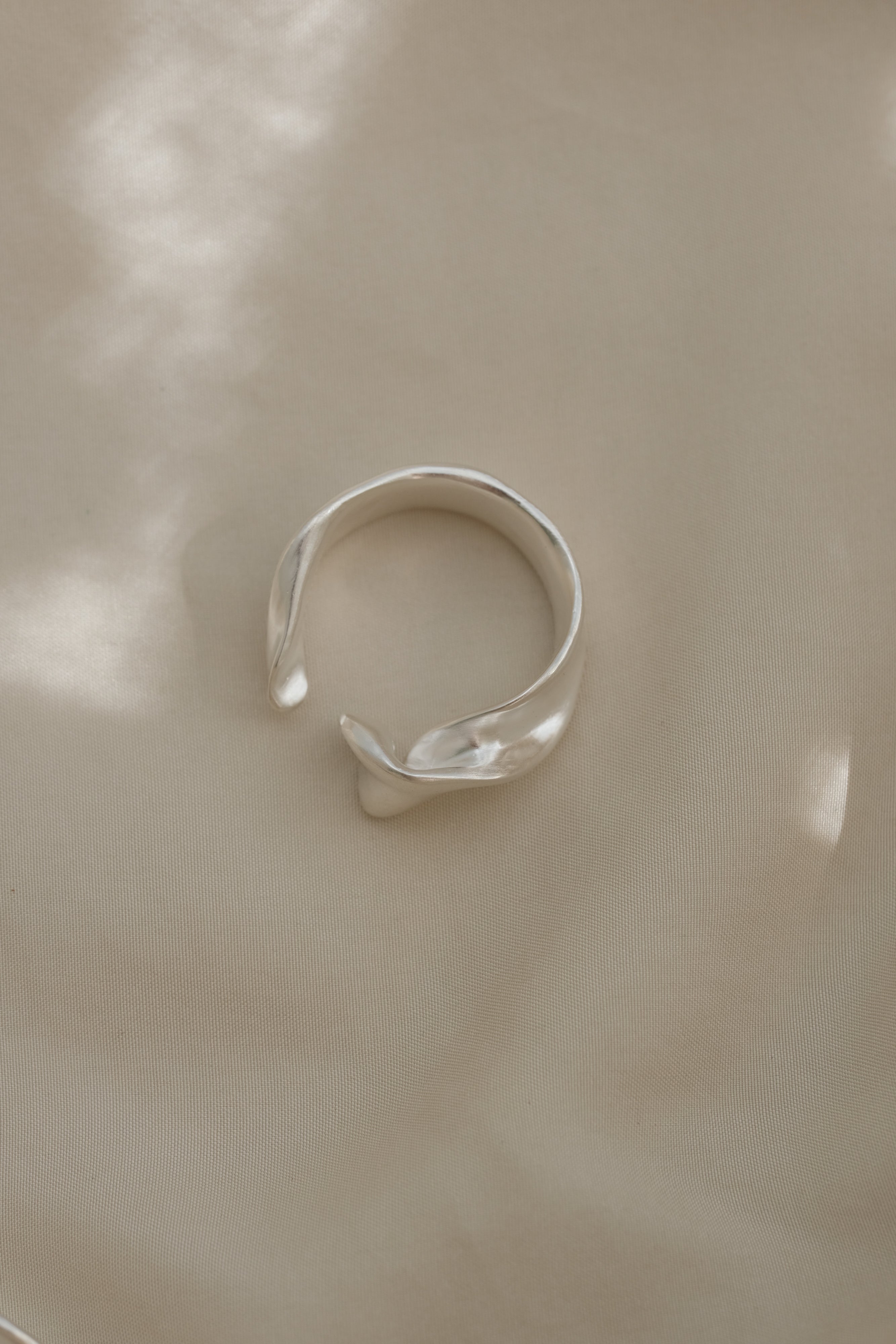 Unique handmade ring in 925 recycled silver with satin finish, crafted in Basel, Switzerland.