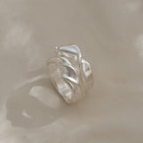 DROP 04 ring four handcrafted in 925 recycled silver, showcasing unique design and satin finish, made in Basel, Switzerland.