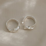 Handmade silver rings, showcasing unique design and sustainable craftsmanship from Basel, Switzerland.