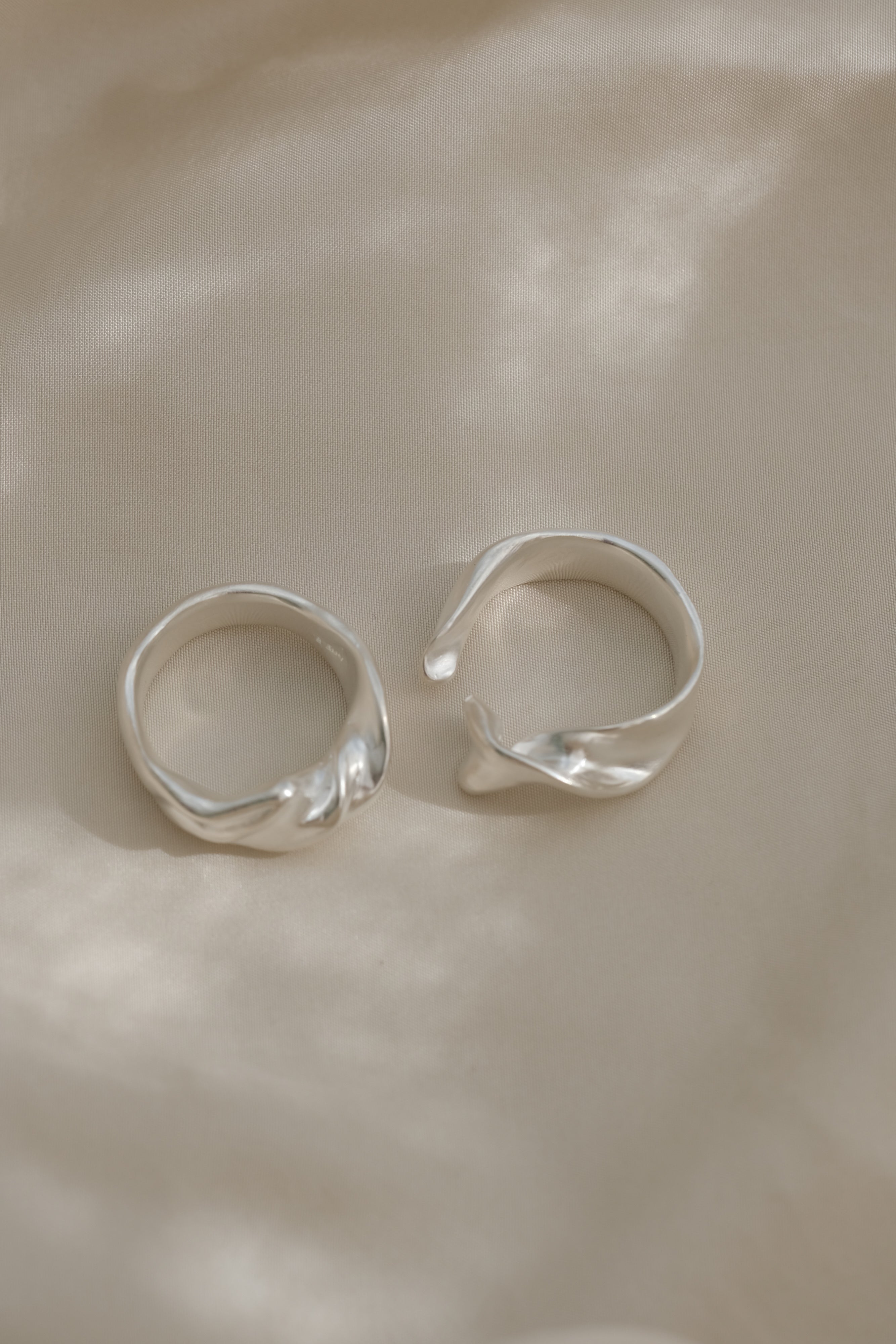 Handmade silver rings, showcasing unique design and sustainable craftsmanship from Basel, Switzerland.