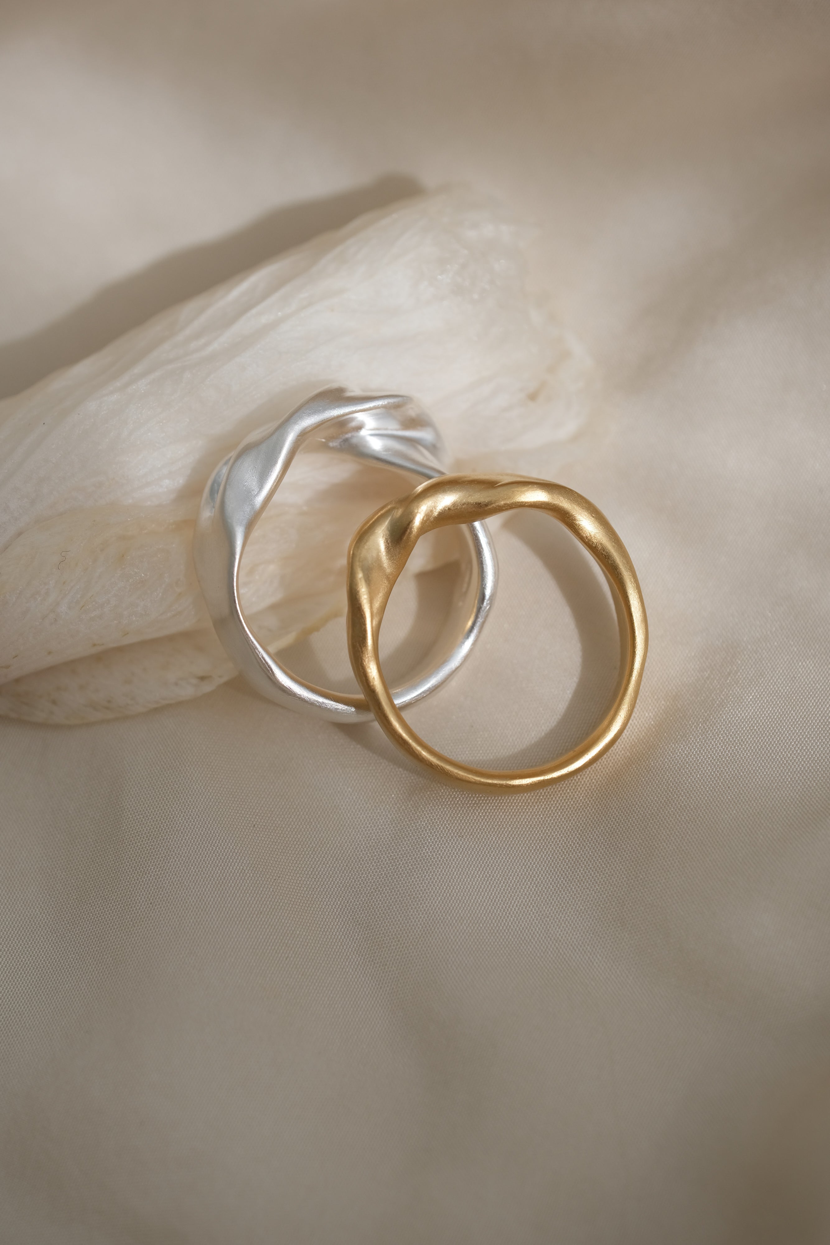 Elegant handmade silver and gold rings, showcasing unique designs, crafted in Basel, Switzerland from sustainable materials.