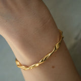 Handmade ethical bracelet, gold-plated on recycled silver, unique design from Basel, Switzerland.