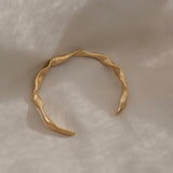 DROP 01 bracelet in 18k gold-plated recycled silver, handmade in Basel, unique ethical and sustainable jewelry piece.