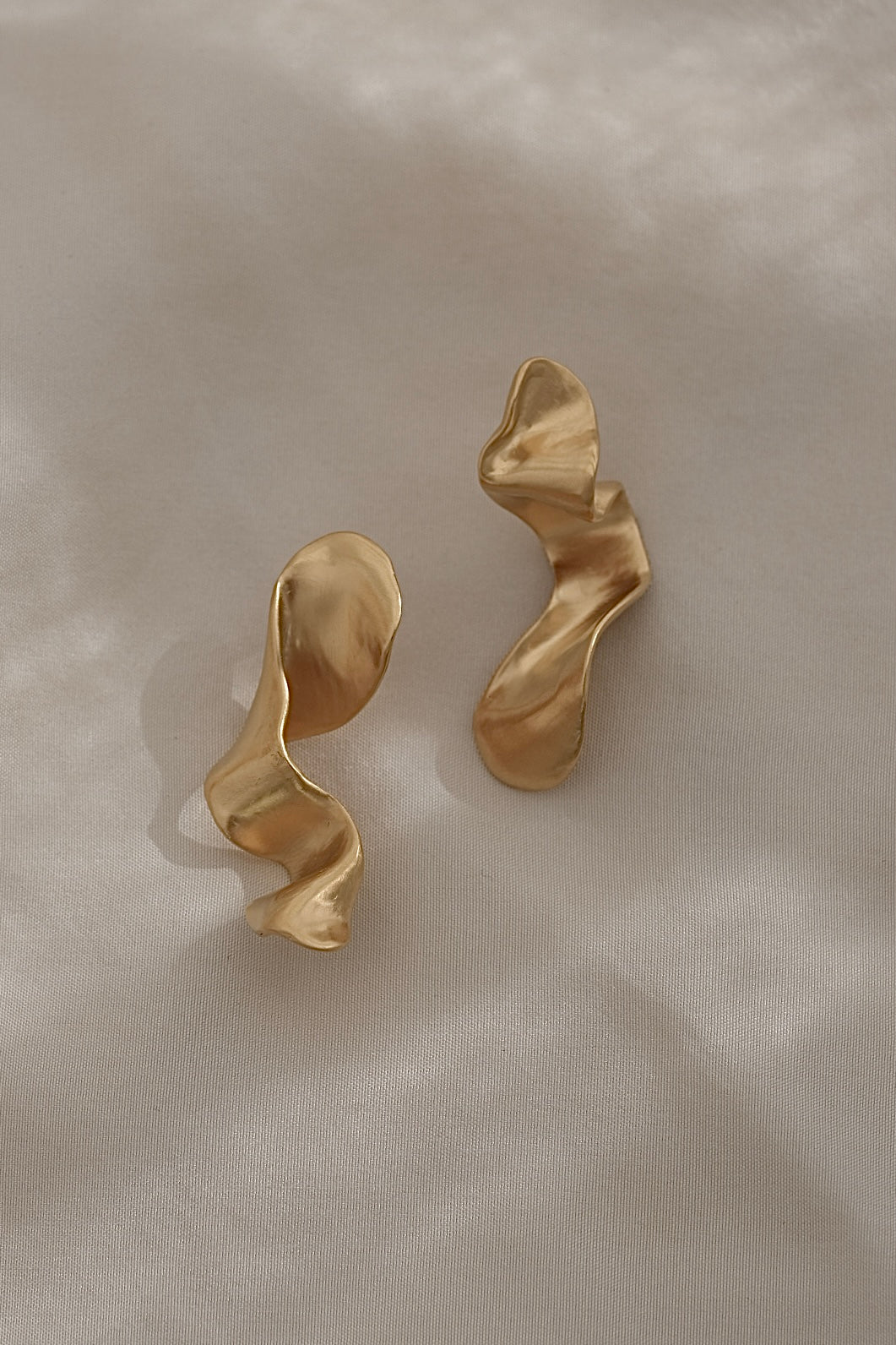 DROP 01 earrings, handmade in Basel Switzerland, sustainable 18k gold-plated recycled silver, unique ethical jewelry.