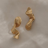 DROP 01 earrings, handmade in Basel Switzerland, sustainable 18k gold-plated recycled silver, unique ethical jewelry.