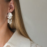 Ethical and sustainable jewelry: handmade 925 recycled silver earrings, unique design from Basel, Switzerland.