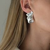 Handmade ethical earrings in 925 recycled silver, featuring a unique design and satin finish, from Basel, Switzerland.