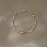 DROP 02 bracelet, handmade in Basel, Switzerland, unique ethical jewelry in 925 recycled silver.