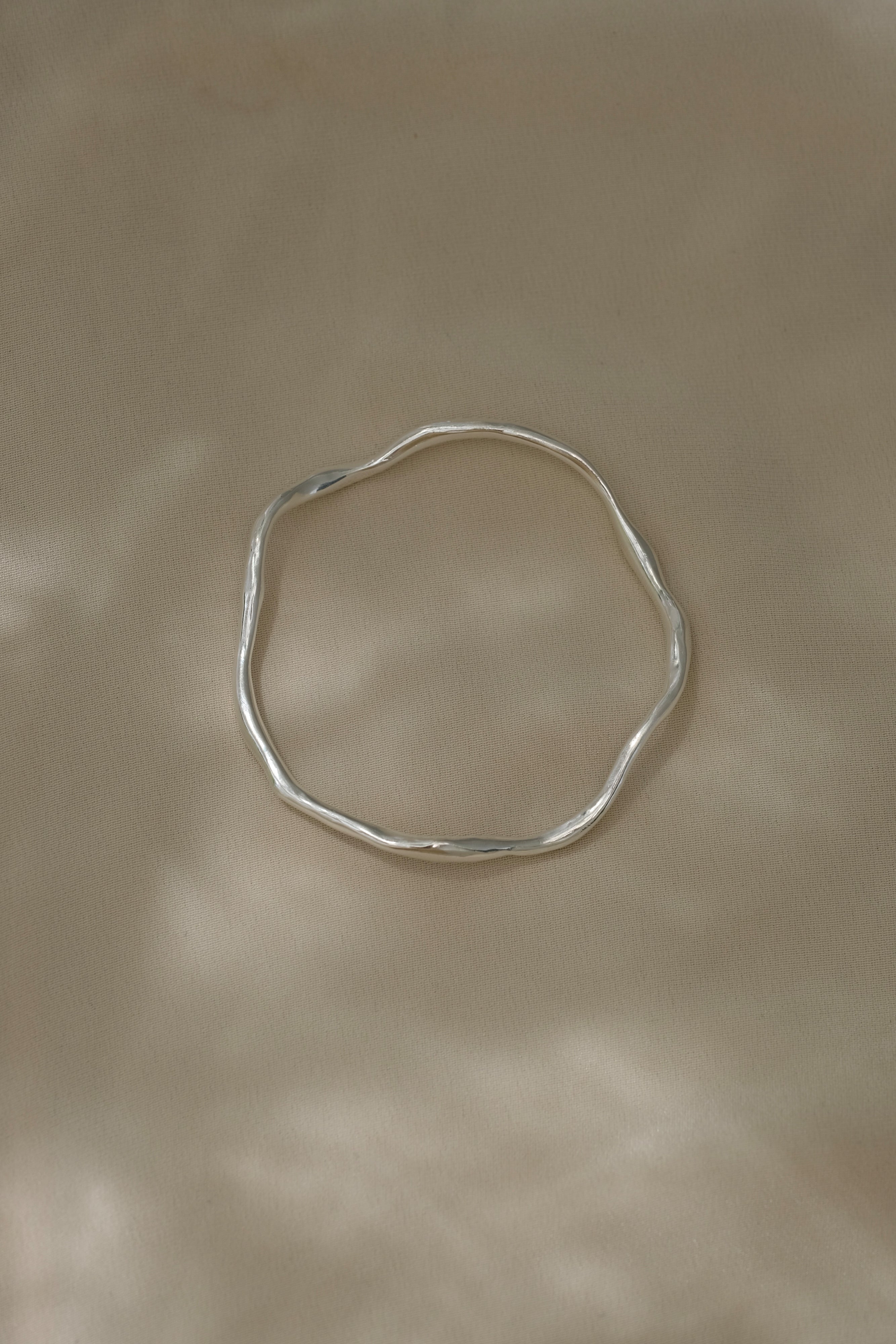 DROP 02 bracelet, handmade in Basel, Switzerland, unique ethical jewelry in 925 recycled silver.