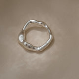 Handmade ring in recycled silver, featuring a unique organic shape, crafted in Basel, Switzerland.