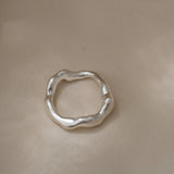 Handmade unique ring in 925 recycled silver, featuring a natural shiny finish, crafted in Basel, Switzerland.